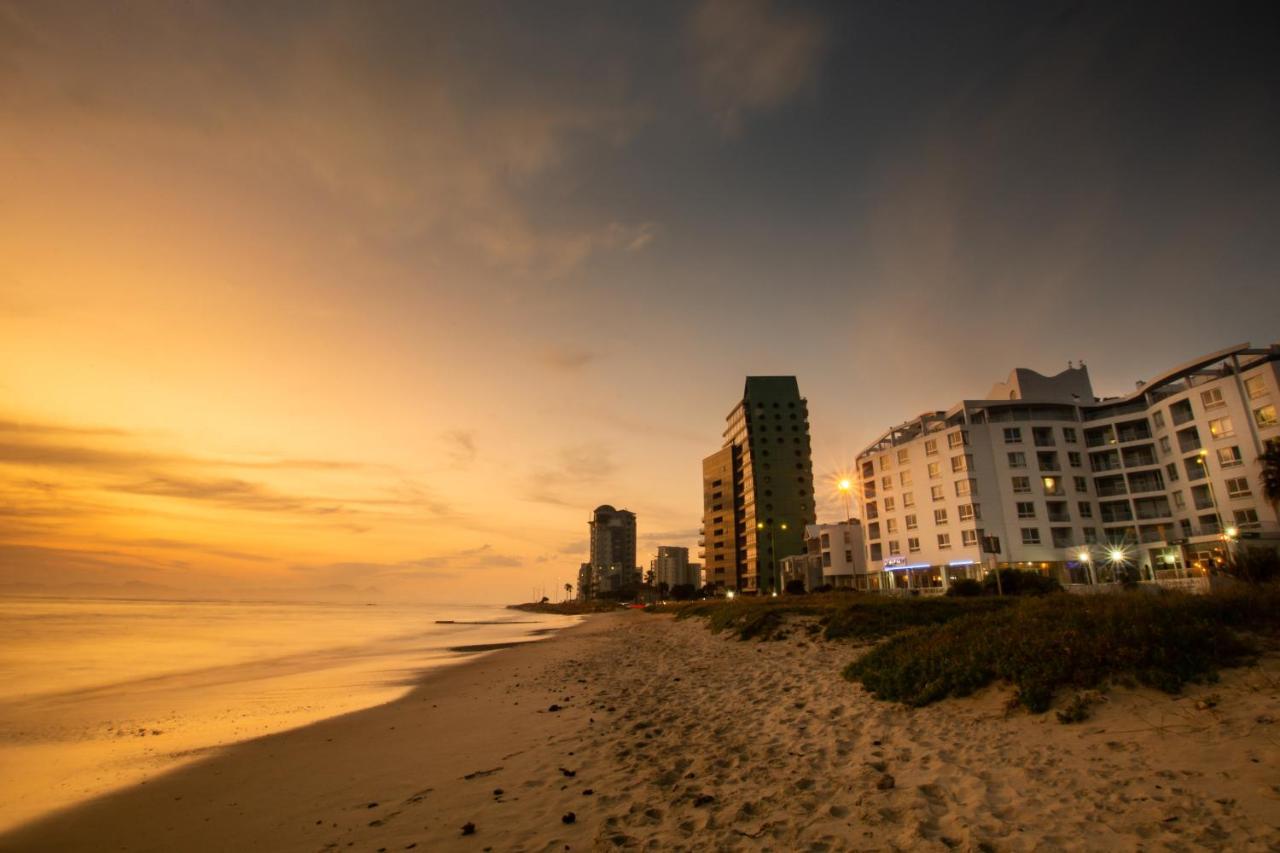 Ocean Breeze Hotel Strand Exterior foto