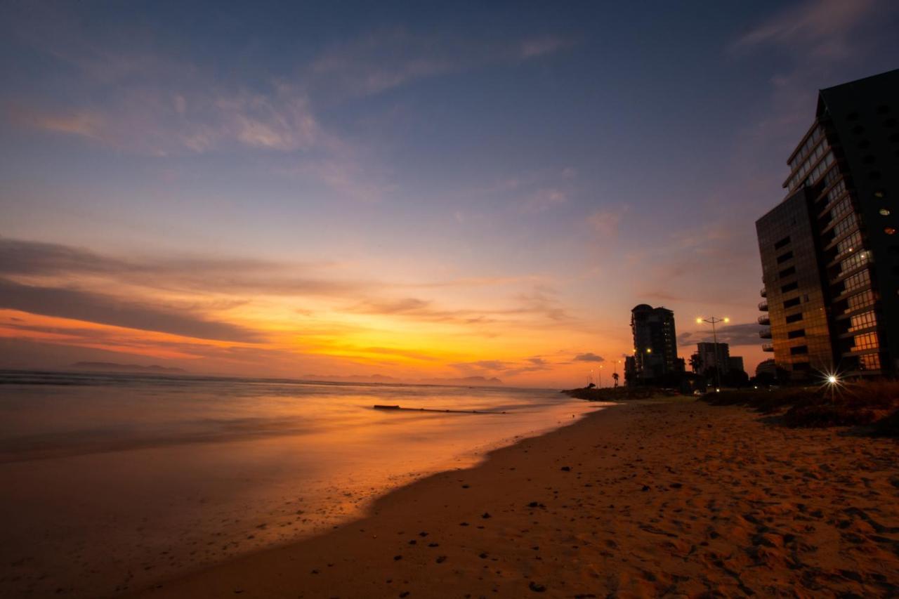 Ocean Breeze Hotel Strand Exterior foto